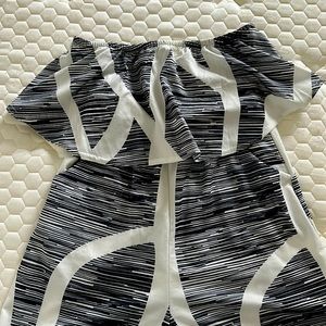 Strapless shorts romper. Black and white. Never worn.
